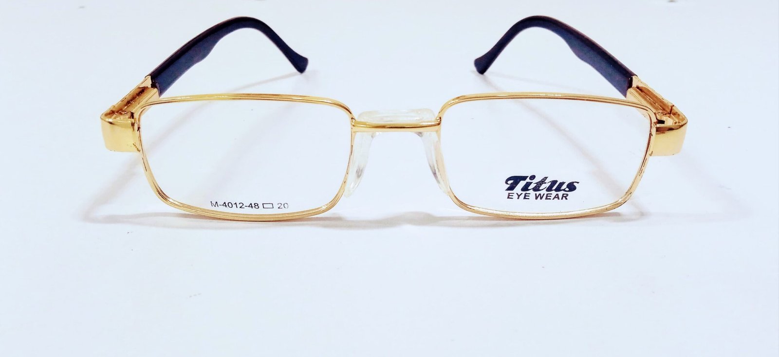 discount Optical Plus Titus golden rim rectangular eye wear