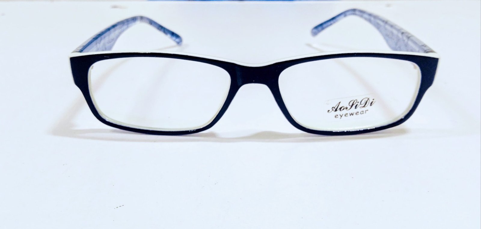 Discount Optical Plus eye wear blue white & black fullrim rectangular frame